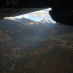 Flight to LUE :: a few seconds before landing in Lukla, Mount Khumbila in sight